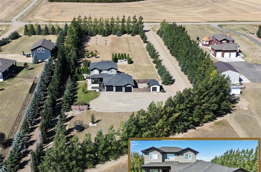 Aerial view from east to west. Note the lot is rectangular and includes the grassy area bottom right.