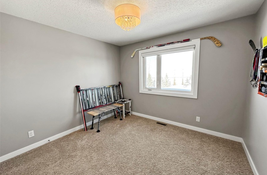 Two of four upper bedrooms with a window to the east.