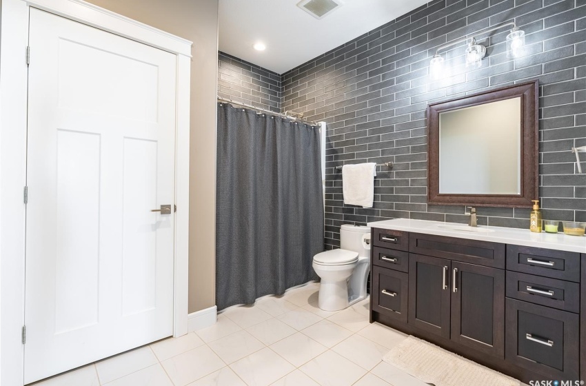 Basement 3 piece bathroom with large closet