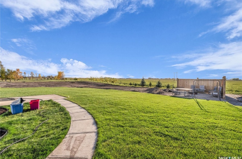 Area behind the property with a firepit area