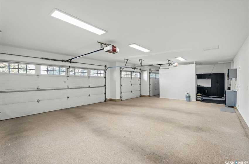 Garage with epoxy floors and a garage door opener