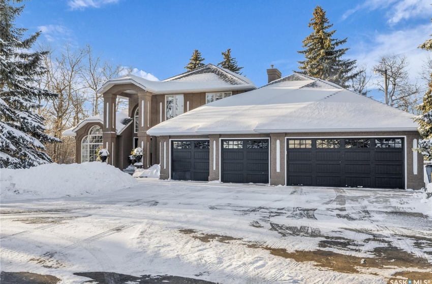 View of front of home with a garage