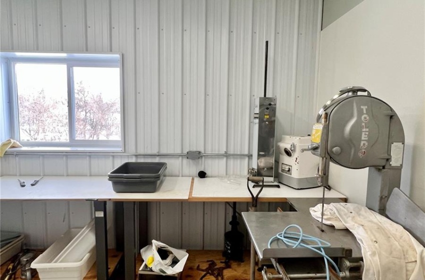 Meat cutting room in shop