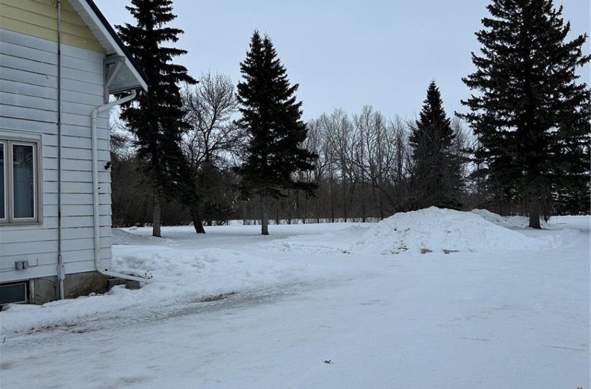 View of yard covered in snow