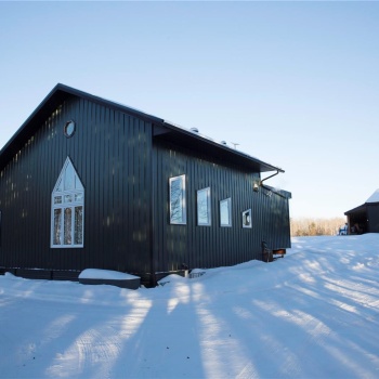 View of snow covered property