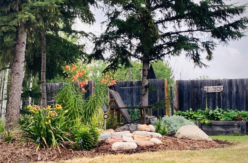 View of yard featuring fence